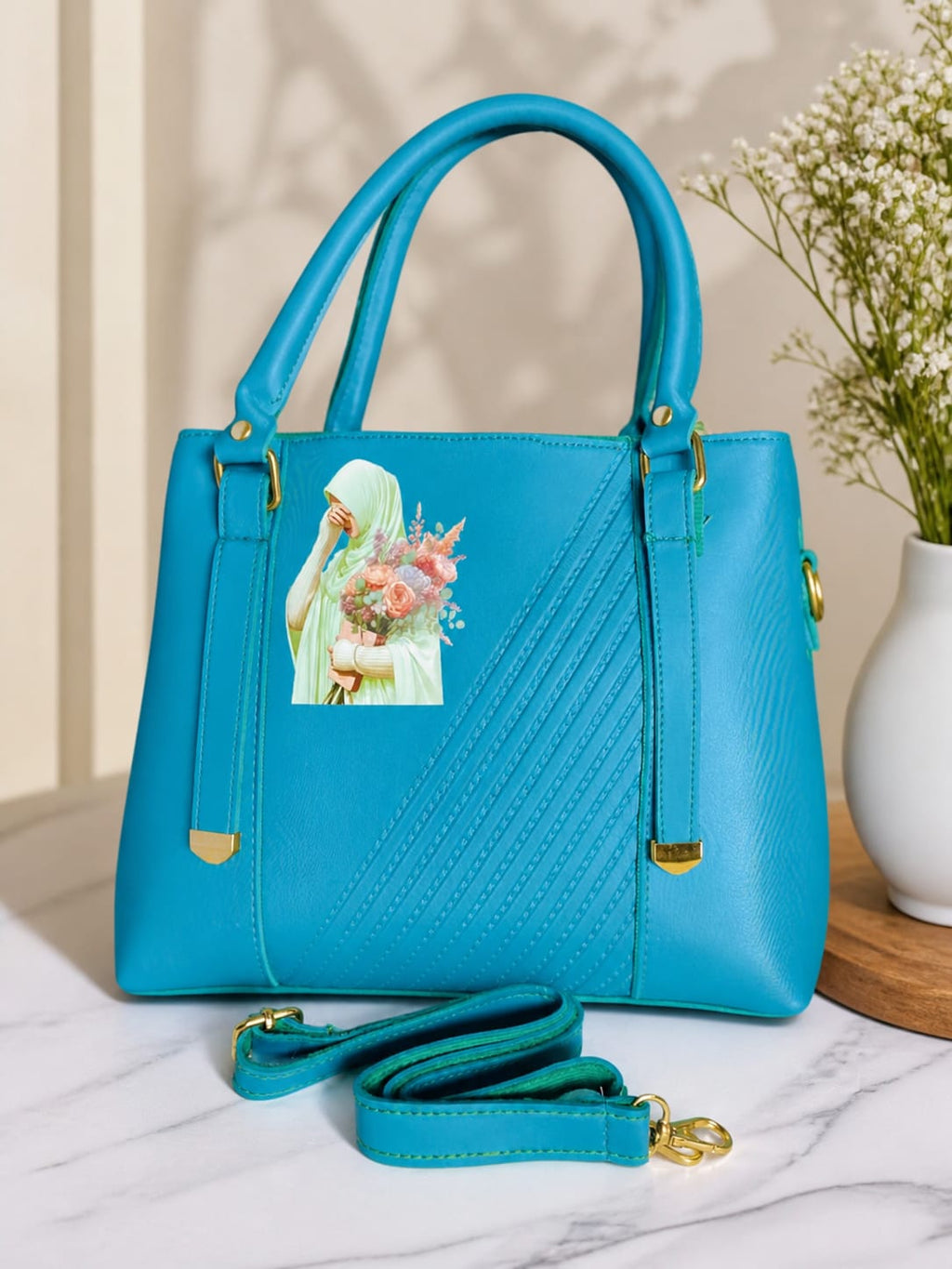 Elegant Turquoise Leather Handbag With Floral Art Design